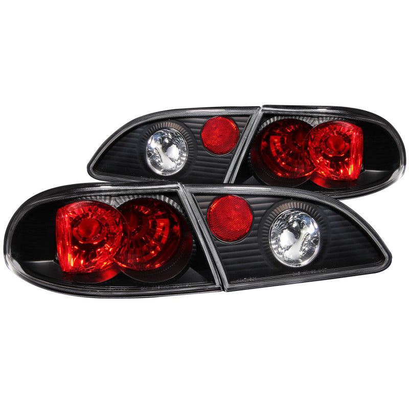 ANZO black taillights for 1998-2002 Toyota Corolla, featuring clear lens and sleek black housing.