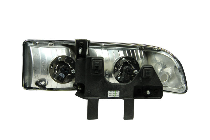 ANZO 1998-2005 Chevrolet S-10 Crystal Headlights with clear lens and chrome housing, designed for enhanced visibility and style.