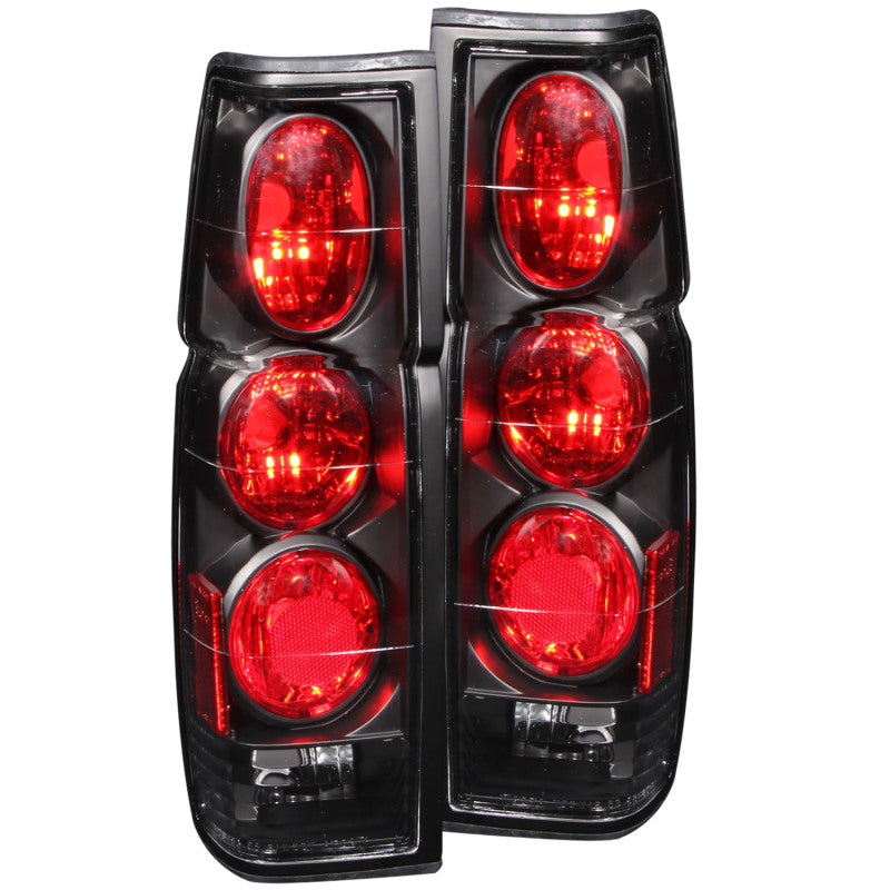 ANZO 1986-1997 Nissan Hardbody taillights with clear lens and black housing, showcasing modern design and enhanced visibility.