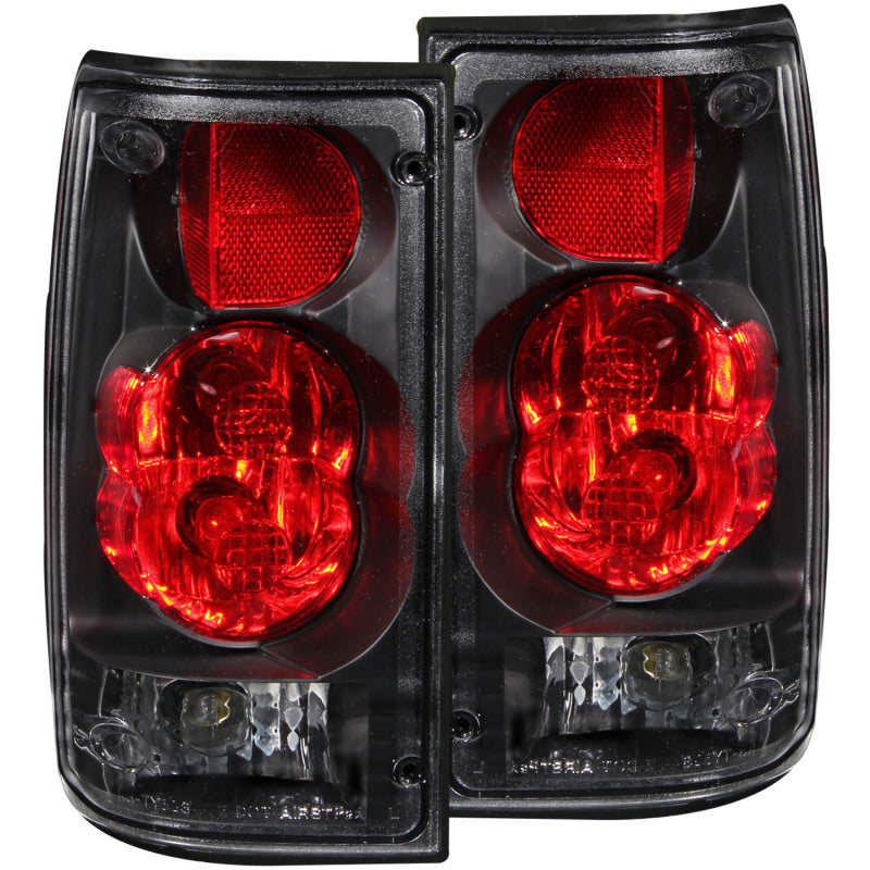 ANZO black taillights for 1989-1995 Toyota Pickup, featuring clear lens and sleek design.