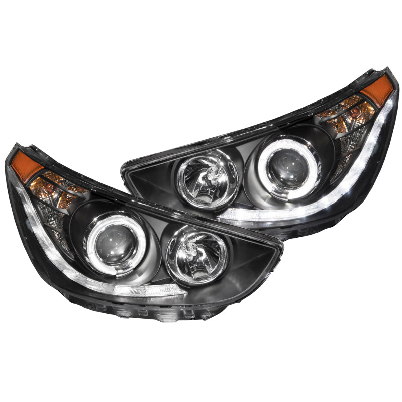 ANZO 2012-2013 Hyundai Accent Projector Headlights with Halo in Black housing, showcasing clear lens and CCFL lighting.