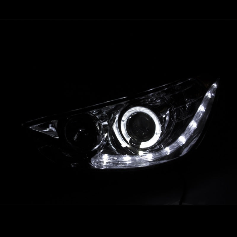 ANZO 2012-2013 Hyundai Accent Projector Headlights with Halo in Black housing, showcasing clear lens and CCFL lighting.