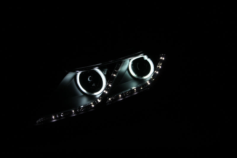 ANZO 2011-2013 Kia Optima Projector Headlights with Halo Black housing, showcasing clear lens and modern design.