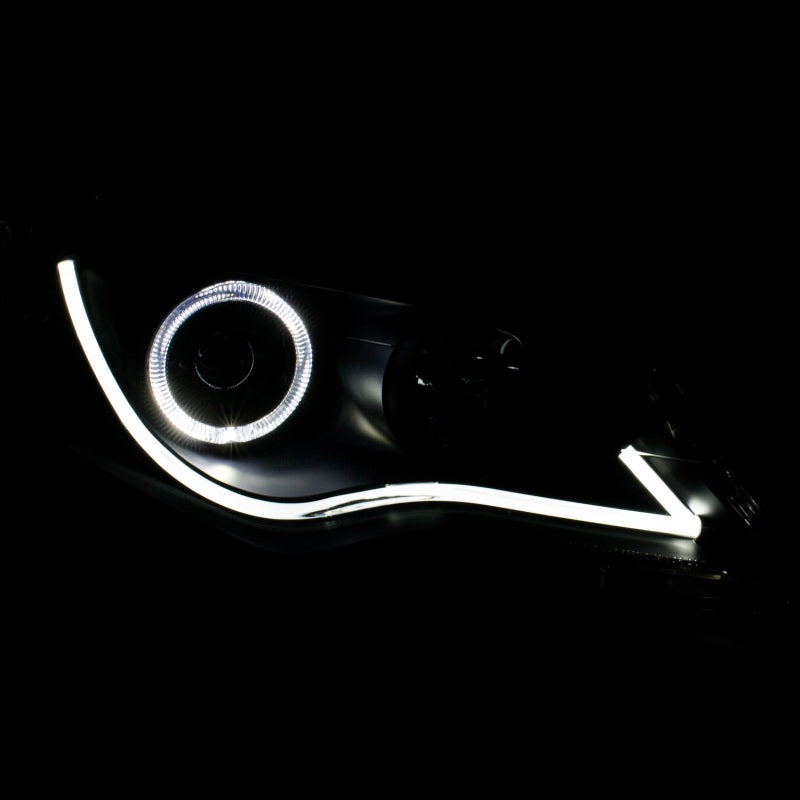 ANZO projector headlights for 2012-2013 Toyota Camry with halo design, showcasing sleek black finish and modern styling.