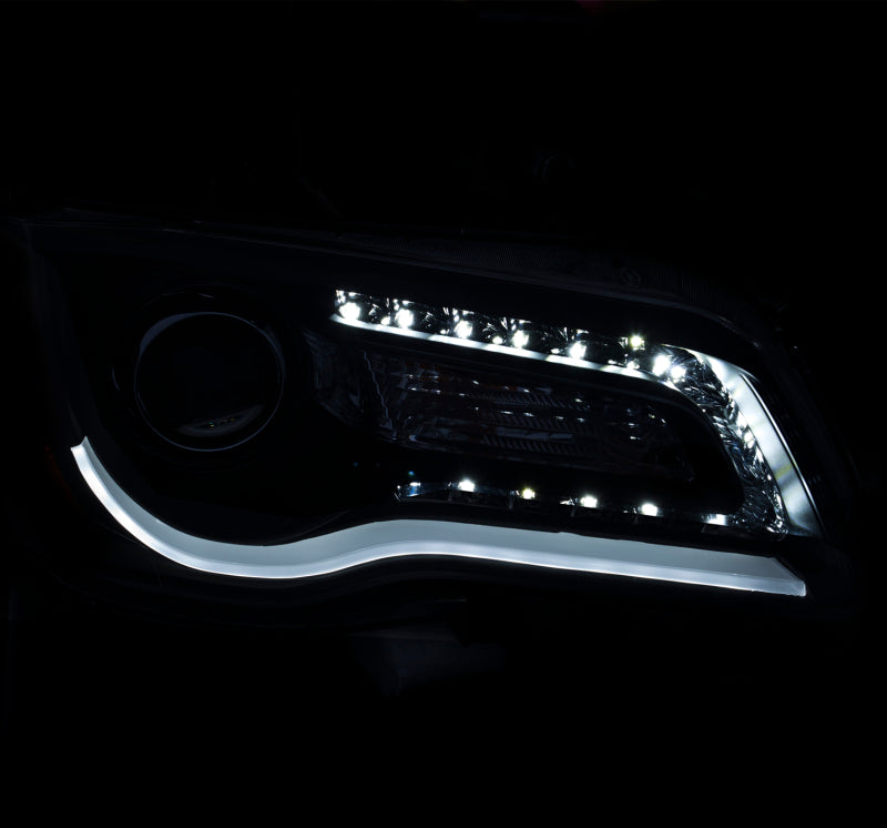 ANZO projector headlights for 2011-2014 Chrysler 300 with clear lens and chrome housing, featuring a plank style design.