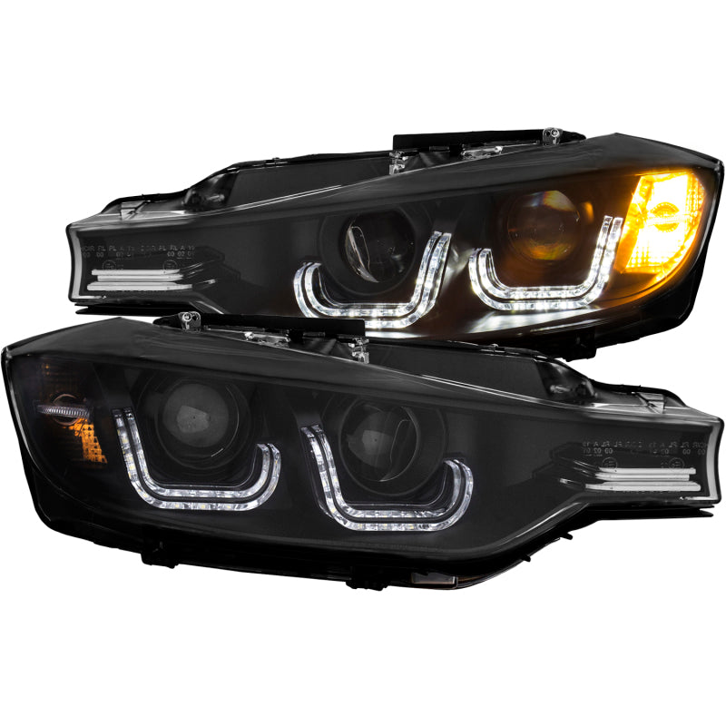 ANZO 2012-2015 BMW 3 Series projector headlights with U-Bar design in black housing, showcasing modern styling and superior illumination.