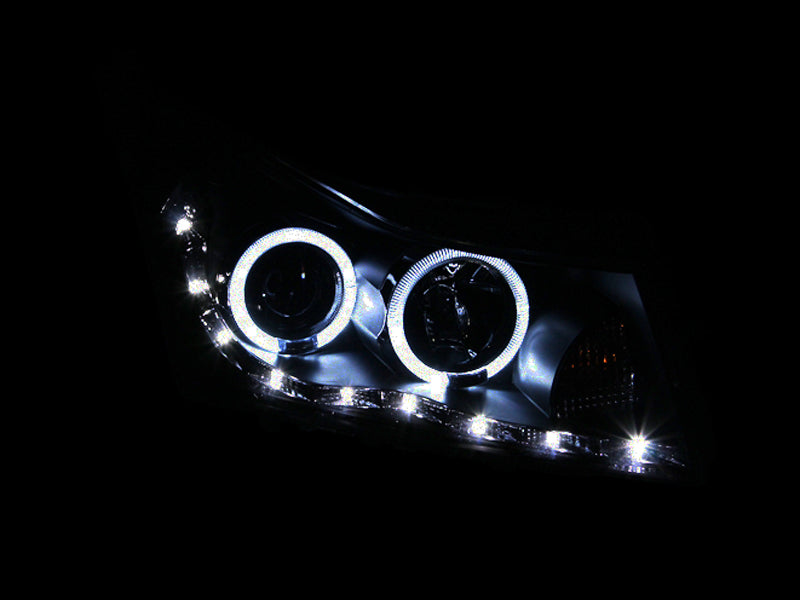 ANZO 2011-2015 Chevrolet Cruze Projector Headlights with Halo and LED, featuring black housing and clear lens for enhanced visibility.