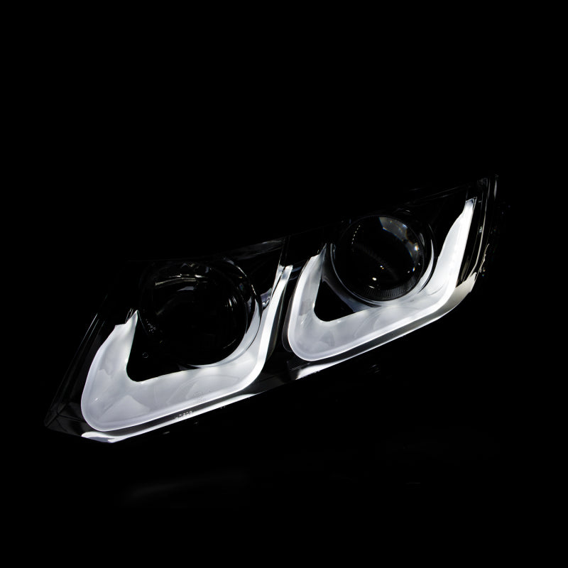 ANZO 2012-2015 Honda Civic projector headlights with U-Bar design in black housing, showcasing clear lens and modern styling.