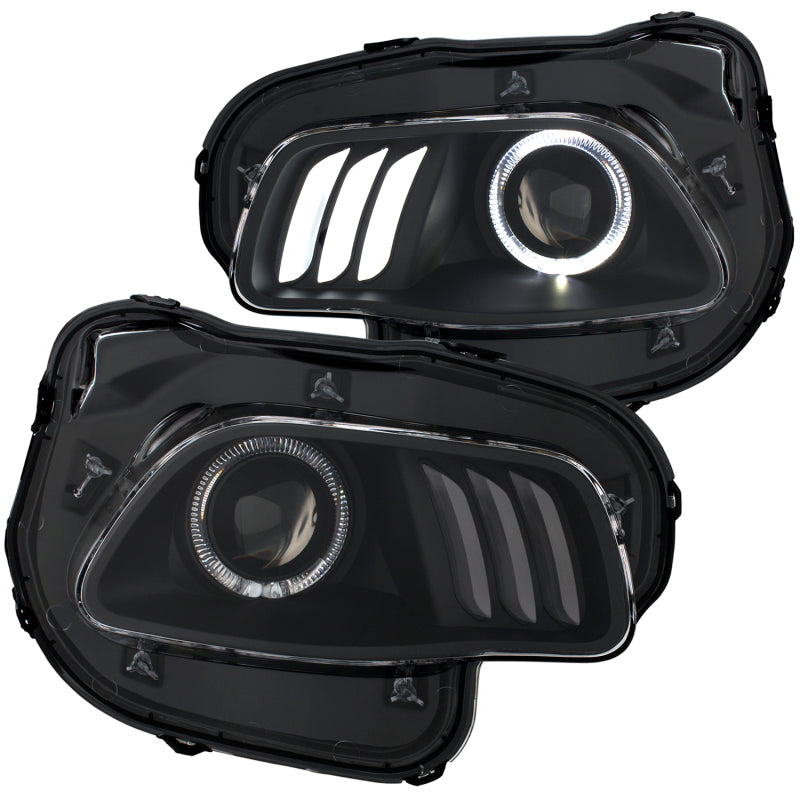 ANZO 2014-2016 Jeep Cherokee Projector Headlights in black clear housing, showcasing innovative design and superior lighting performance.