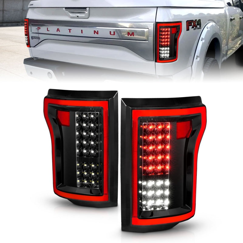 ANZO 2015-2016 Ford F-150 LED taillights in black with clear lens and chrome housing.