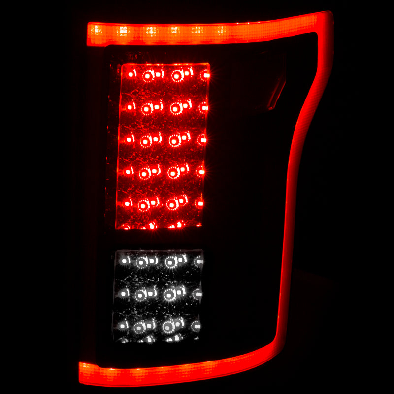 ANZO LED taillights for 2015-2016 Ford F-150 in red and clear design, showcasing chrome housing and clear lens.