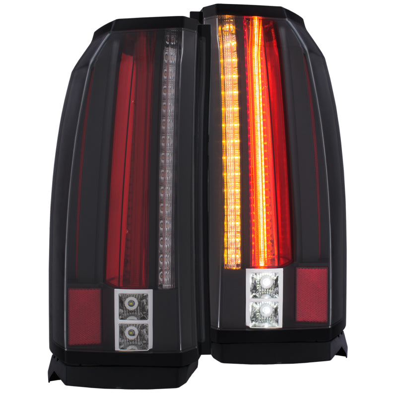 ANZO LED taillights for 2015-2017 GMC Yukon in sleek black housing, showcasing modern design and enhanced visibility.