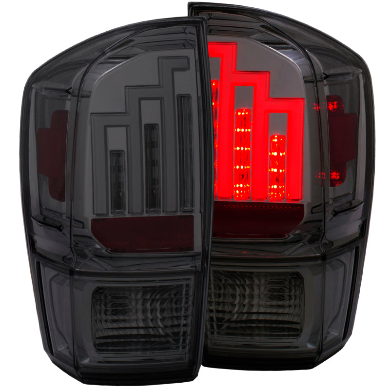 ANZO LED taillights for 2016-2017 Toyota Tacoma with smoke lens, showcasing modern design and enhanced visibility.