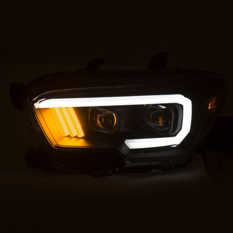 ANZO 2016-2017 Toyota Tacoma Projector Headlights with plank style design, showcasing modern aesthetics and superior illumination.