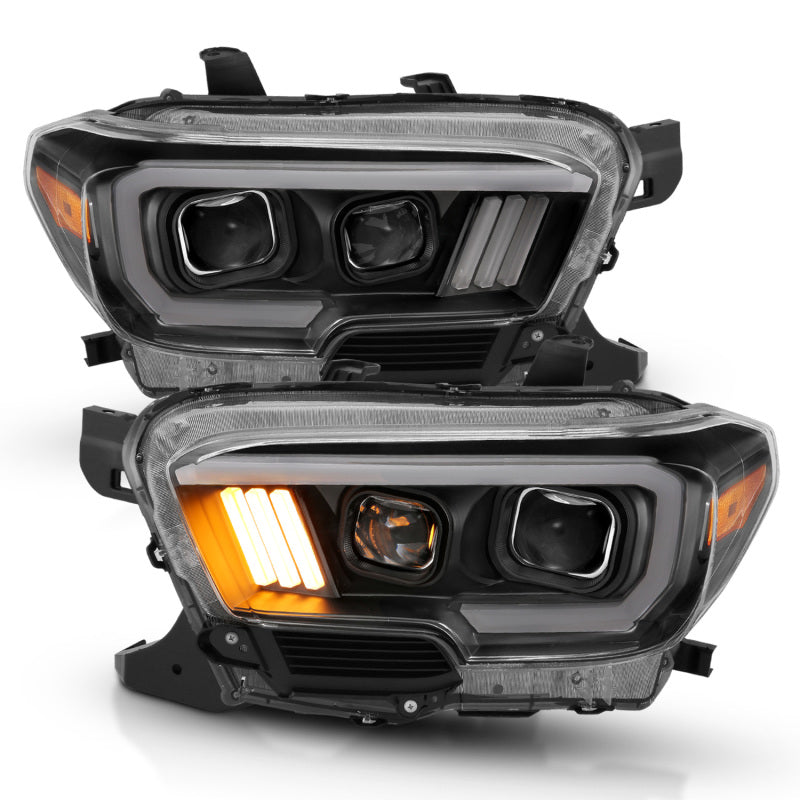 ANZO 2016-2017 Toyota Tacoma Projector Headlights with plank style design, showcasing modern aesthetics and superior illumination.