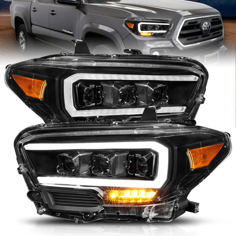 ANZO TRD LED projector headlights for 2016-2017 Toyota Tacoma with clear lens and black housing.