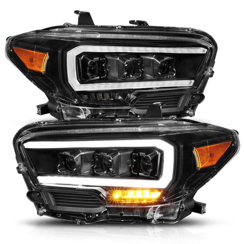 ANZO TRD LED projector headlights for 2016-2017 Toyota Tacoma with clear lens and black housing.