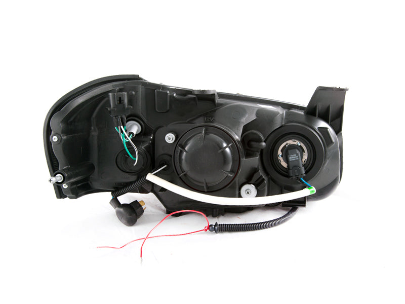 ANZO Crystal Headlights for 2002-2003 Nissan Maxima with Halo Black design, featuring clear lens and black housing.