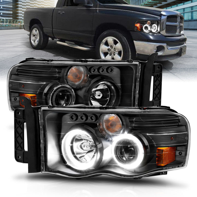 ANZO 2002-2005 Dodge Ram 1500 projector headlights with halo design, featuring black housing and clear/amber lens.