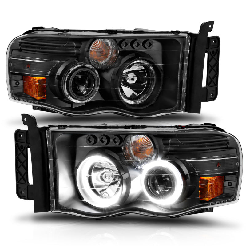 ANZO 2002-2005 Dodge Ram 1500 projector headlights with halo design, featuring black housing and clear/amber lens.