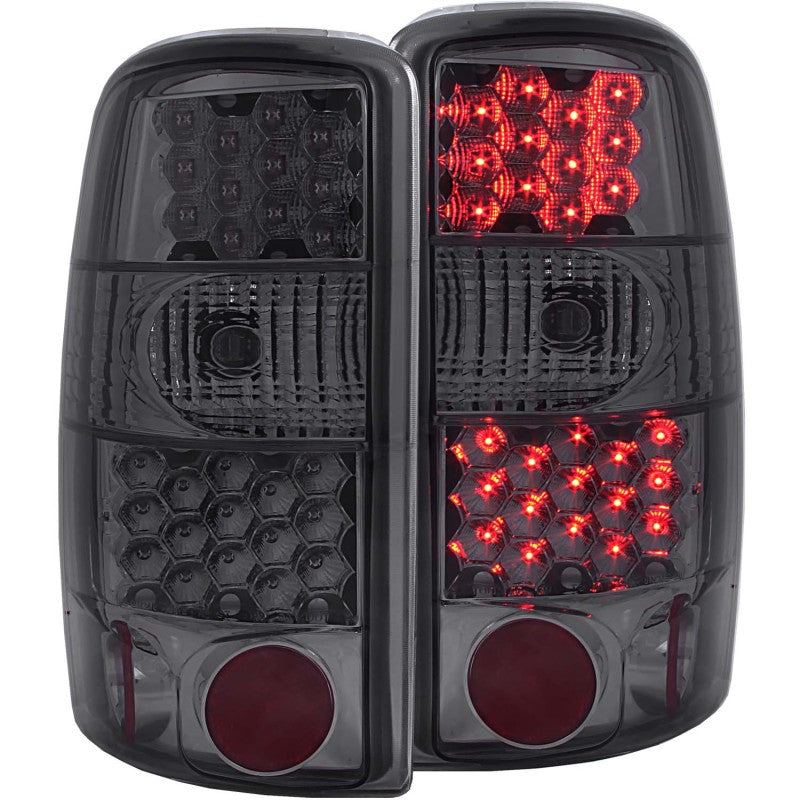 ANZO LED taillights for 2000-2006 Chevrolet Suburban with smoke lens, showcasing modern design and bright illumination.