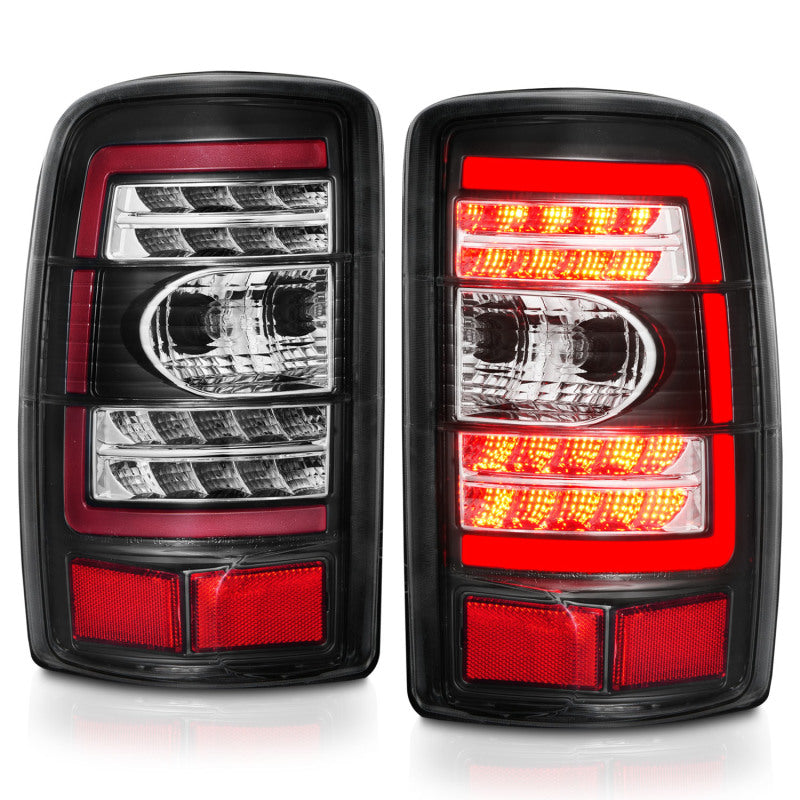 ANZO LED Tail Lights for 2000-2006 Chevrolet Tahoe with clear lens and black housing, showcasing modern design and enhanced visibility.