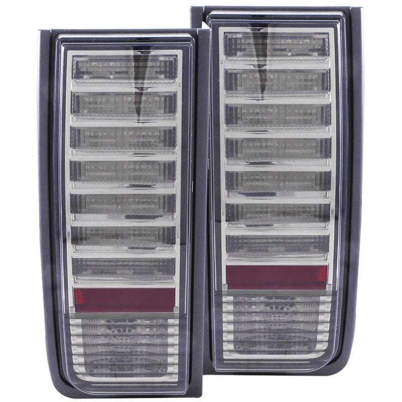 ANZO LED taillights for 2003-2009 Hummer H2 with smoke lens, showcasing modern design and bright illumination.