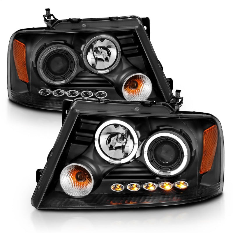 ANZO 2004-2008 Ford F-150 projector headlights featuring halo and LED lights with black housing and clear lens.