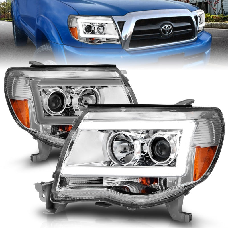 ANZO 2005-2011 Toyota Tacoma Projector Headlights with Light Bar in chrome finish, showcasing modern design and powerful illumination.