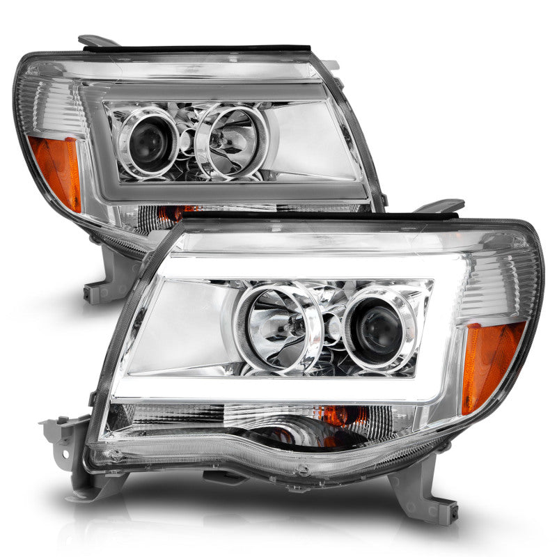 ANZO 2005-2011 Toyota Tacoma Projector Headlights with Light Bar in chrome finish, showcasing modern design and powerful illumination.