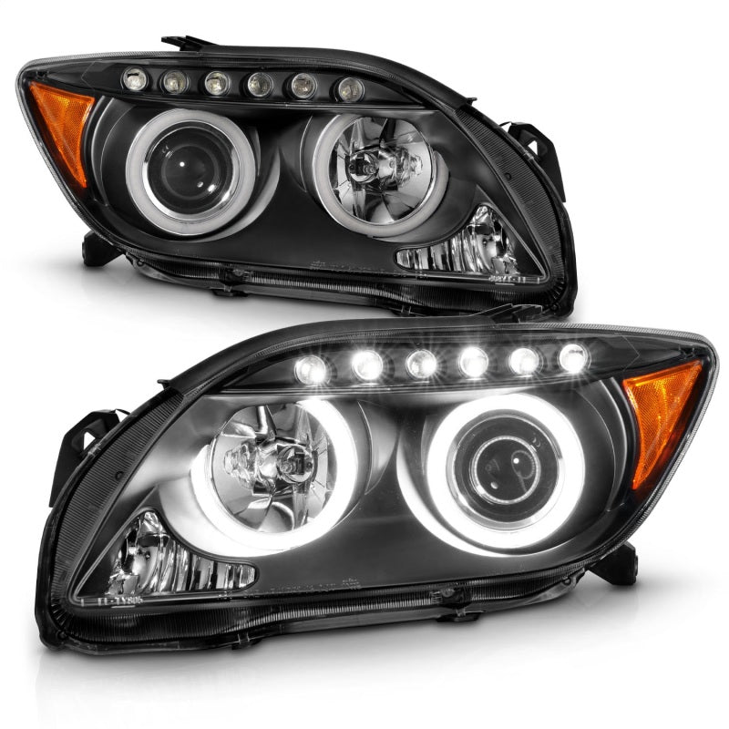 ANZO 2005-2010 Scion tC projector headlights with black housing and halo CCFL rings, showcasing modern automotive lighting design.