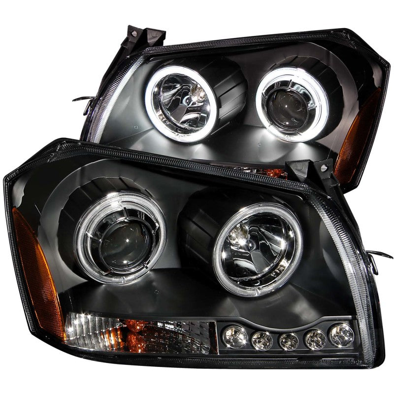 ANZO 2005-2007 Dodge Magnum projector headlights with black housing and halo rings, showcasing clear lens design.