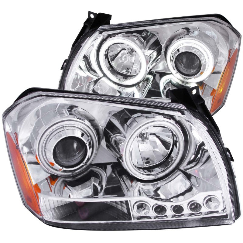 ANZO 2005-2007 Dodge Magnum projector headlights with chrome housing and halo rings, showcasing clear lens design.