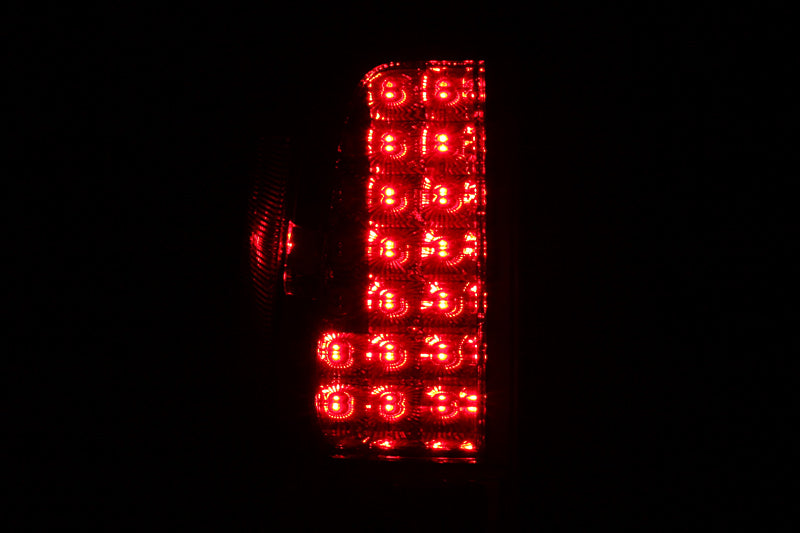 ANZO 2005-2008 Nissan Frontier LED Taillights in Red and Clear lens, showcasing modern design and bright illumination.