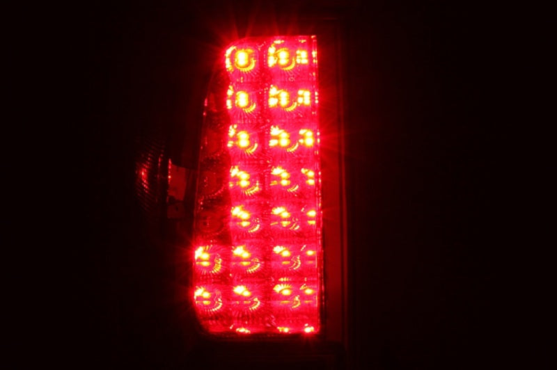 ANZO LED taillights for 2005-2008 Nissan Frontier featuring red and smoke lens design.