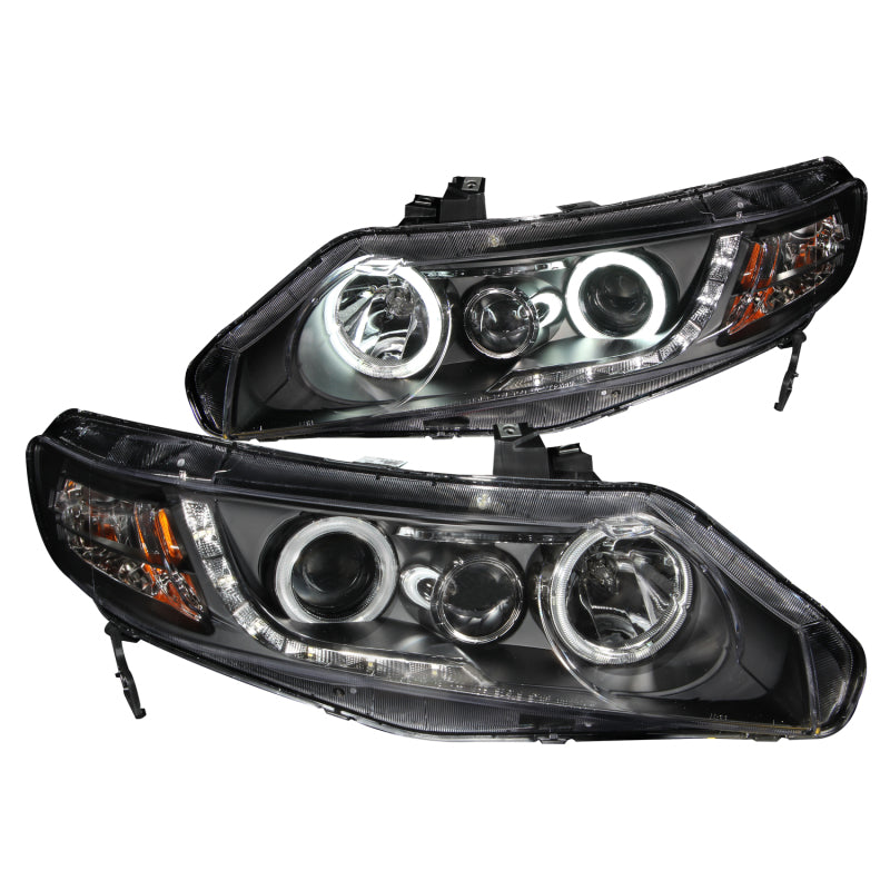 ANZO 2006-2011 Honda Civic Projector Headlights with Halo Black design, featuring clear lens and black housing.