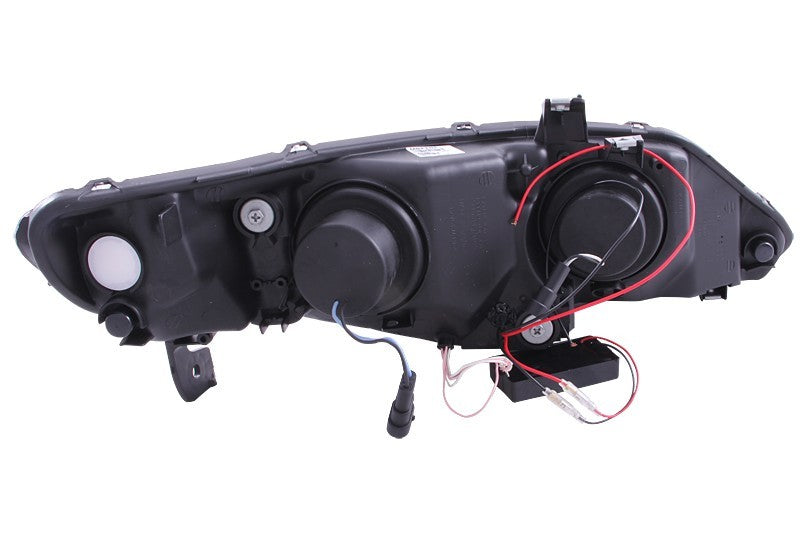 ANZO 2006-2011 Honda Civic Projector Headlights with Halo Black design, featuring clear lens and black housing.