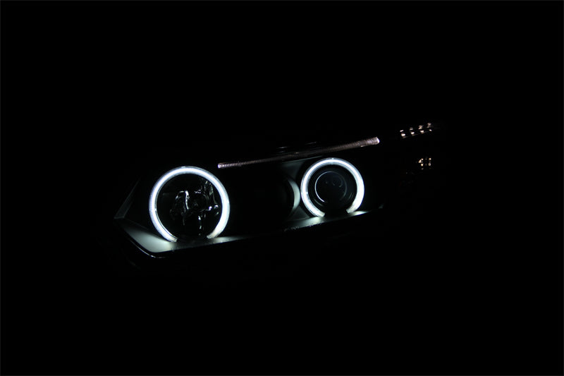 ANZO 2006-2011 Honda Civic Projector Headlights with Halo Black housing and clear lens, showcasing stylish design and enhanced visibility.