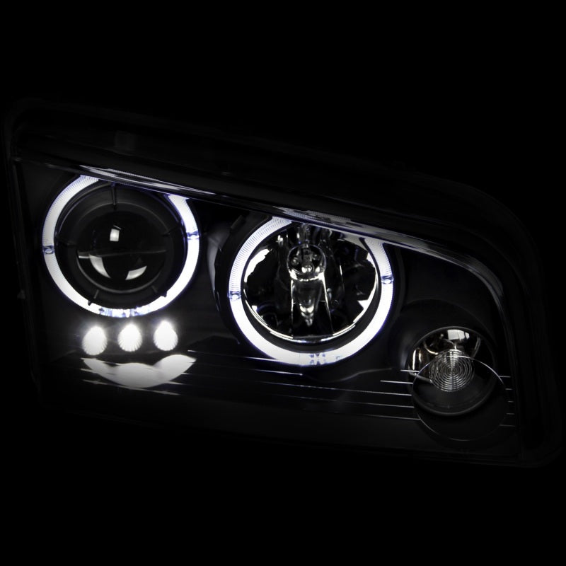 ANZO 2006-2010 Dodge Charger Projector Headlights with Halo in black housing, showcasing clear lens and stylish design.