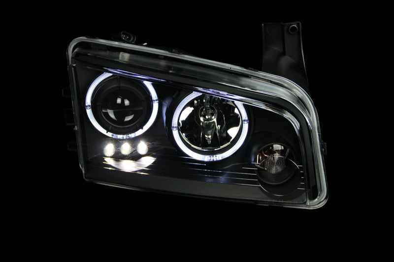 ANZO 2006-2010 Dodge Charger Projector Headlights with Halo in black housing, showcasing clear lens and stylish design.