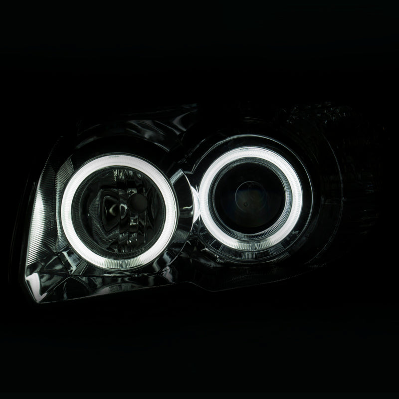 ANZO 2006-2009 Toyota 4Runner Projector Headlights with Halo Chrome, showcasing clear lens and chrome housing.