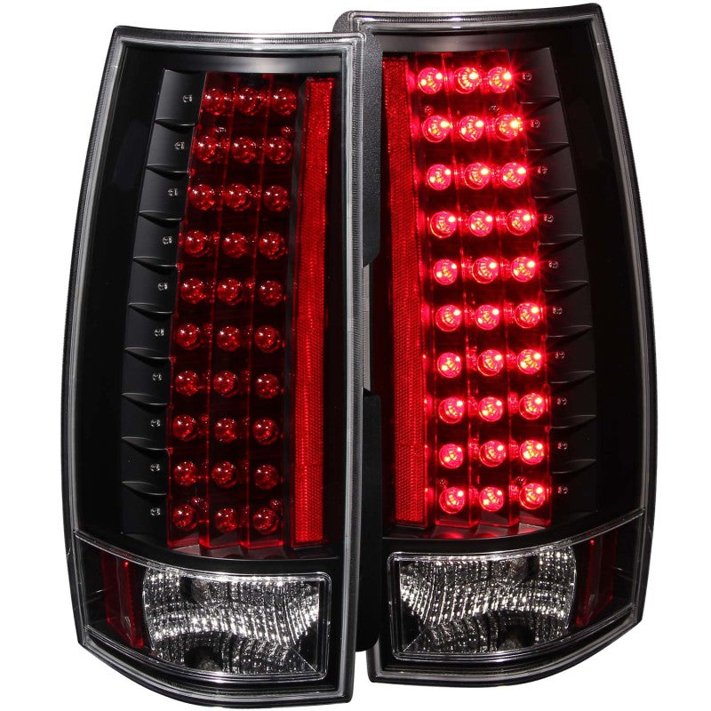 ANZO 2007-2013 Chevrolet Suburban LED taillights in black housing with clear lens, showcasing modern design and bright illumination.