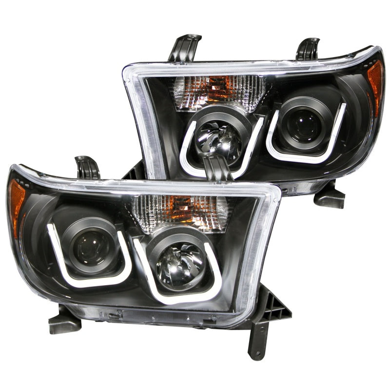 ANZO projector headlights for 2007-2013 Toyota Tundra with U-Bar design and black housing.