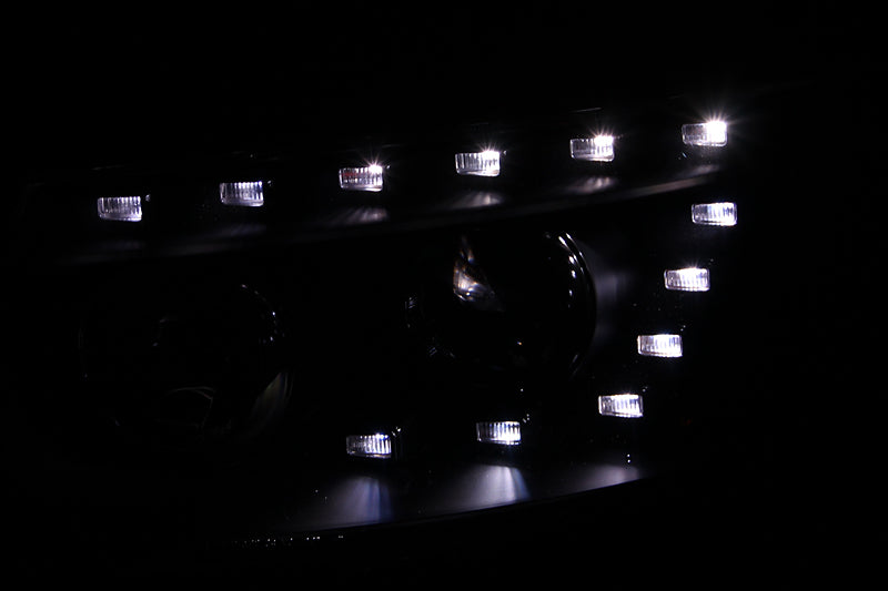 ANZO 2007-2007 Hyundai Santa Fe projector headlights with LED black housing, showcasing clear lens and modern design.