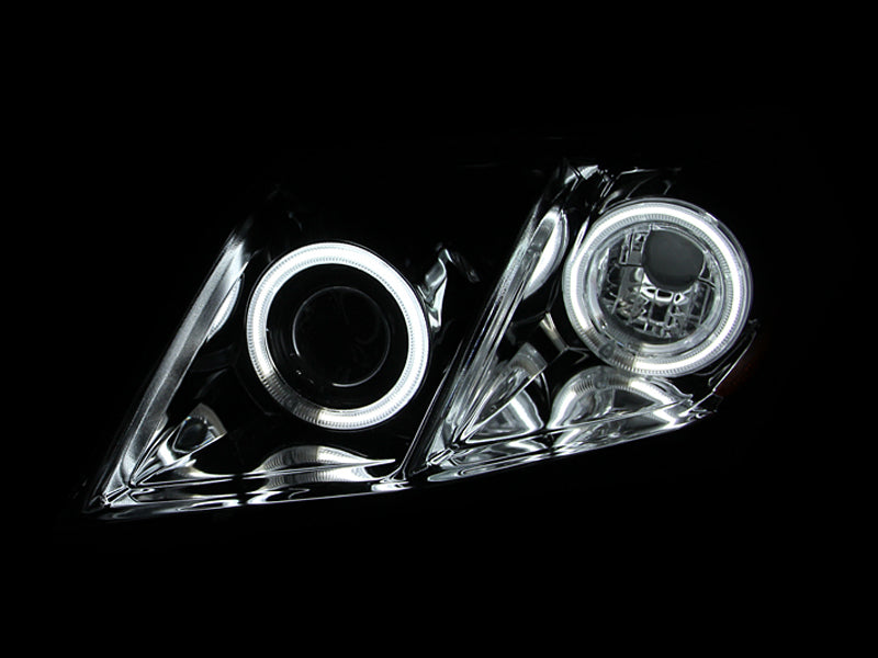 ANZO 2007-2009 Toyota Camry Projector Headlights with Halo design in black housing and clear lens, showcasing modern automotive lighting.