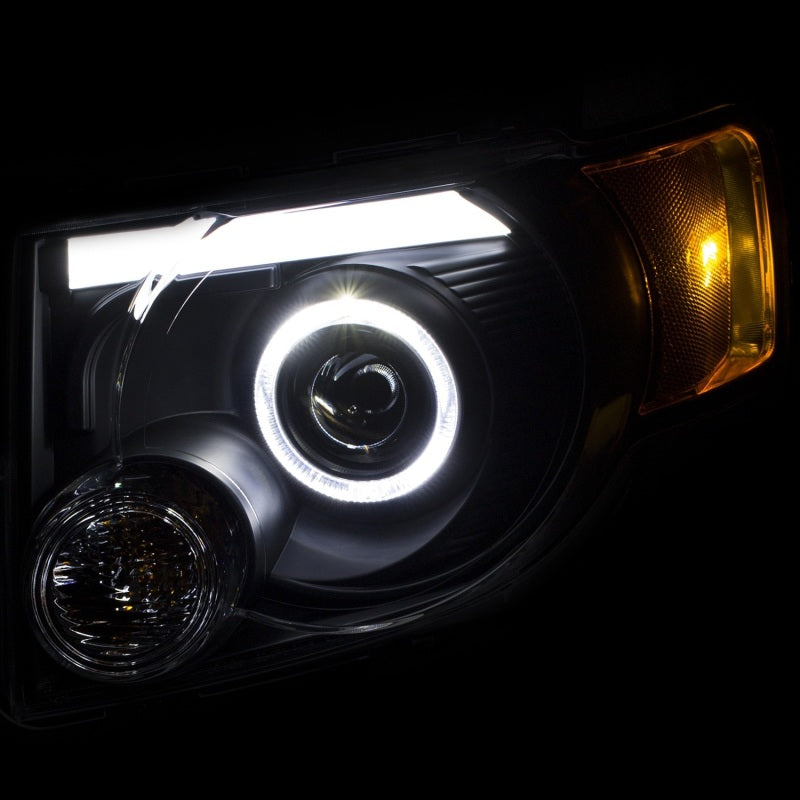 ANZO 2008-2012 Ford Escape projector headlights with halo black design, showcasing modern styling and enhanced visibility.