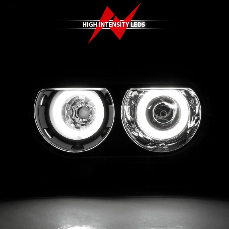 ANZO 2008-2014 Dodge Challenger projector headlights with black housing and halo ring, showcasing modern automotive lighting design.