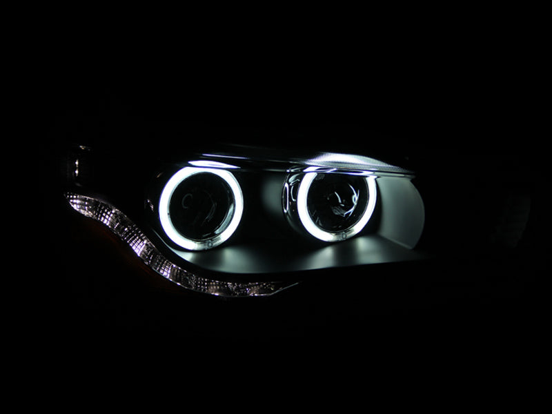 ANZO 2008-2015 Mitsubishi Lancer Projector Headlights with Halo Black design, featuring clear lens and black housing.