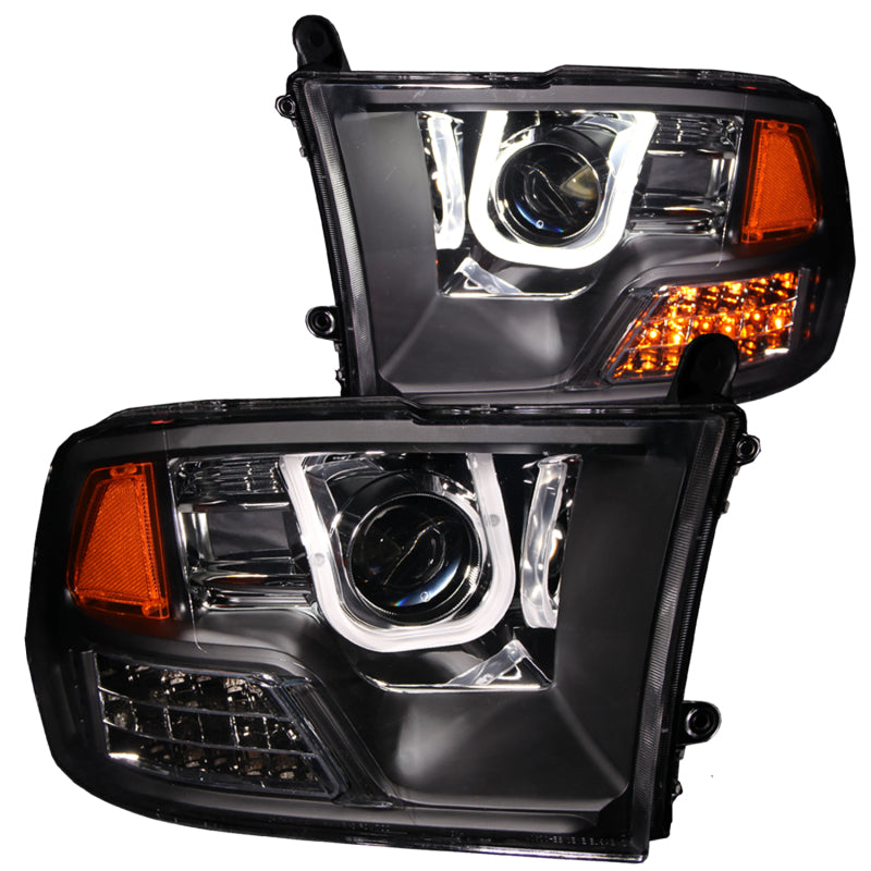 ANZO 2009-2016 Dodge Ram 1500 Projector Headlights with U-Bar in black housing, showcasing clear lens design.