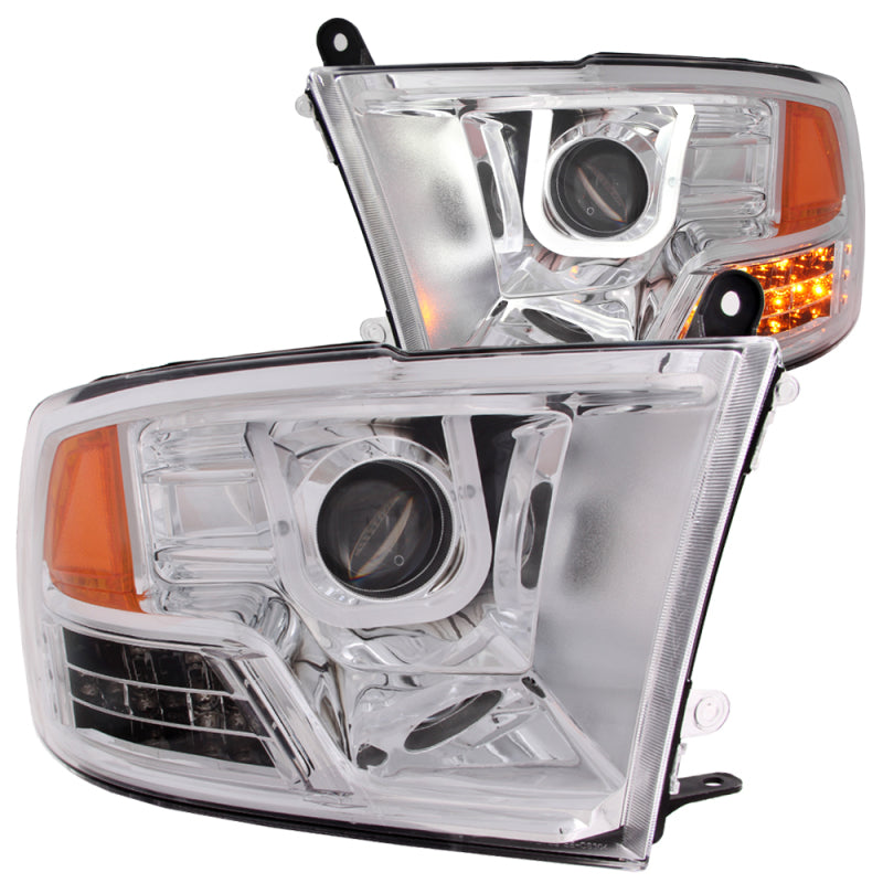 ANZO 2009-2016 Dodge Ram 1500 projector headlights with U-Bar chrome design, showcasing clear lens and chrome housing.